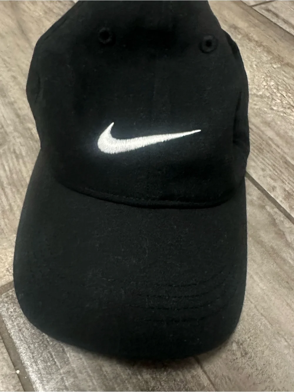 Nike Black Cap with White Swoosh Logo